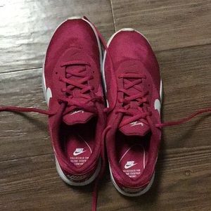 Reddish/Pink Gently Used Nike Air Ladies sneaker